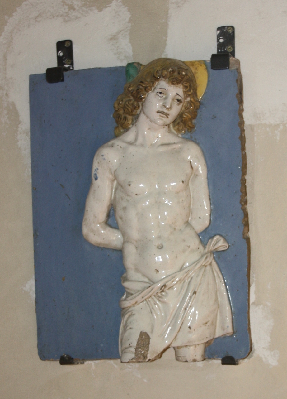 San Sebastiano, San Sebastiano (rilievo, elemento d'insieme) di Della Robbia Andrea (bottega) (fine sec. XV)