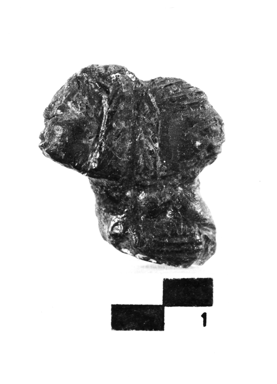 testa umana bifrontale (pendaglio (?)) - fase Piceno IV A (primo quarto sec. VI a.C)