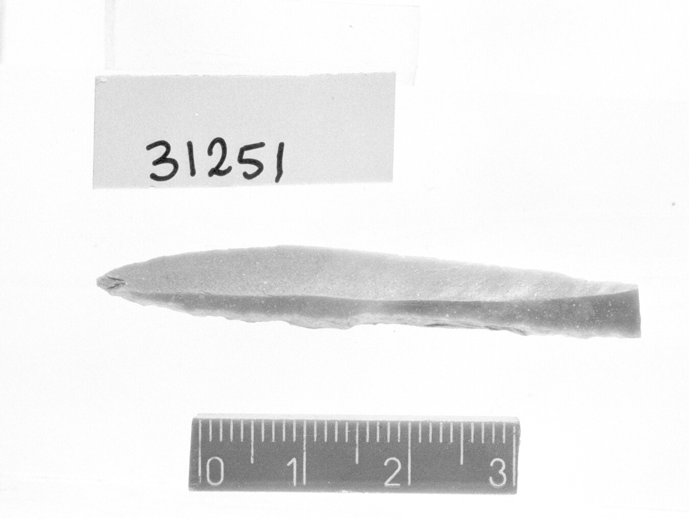 punta a dorso totale con ritocco - Gravettiano (Paleolitico superiore)