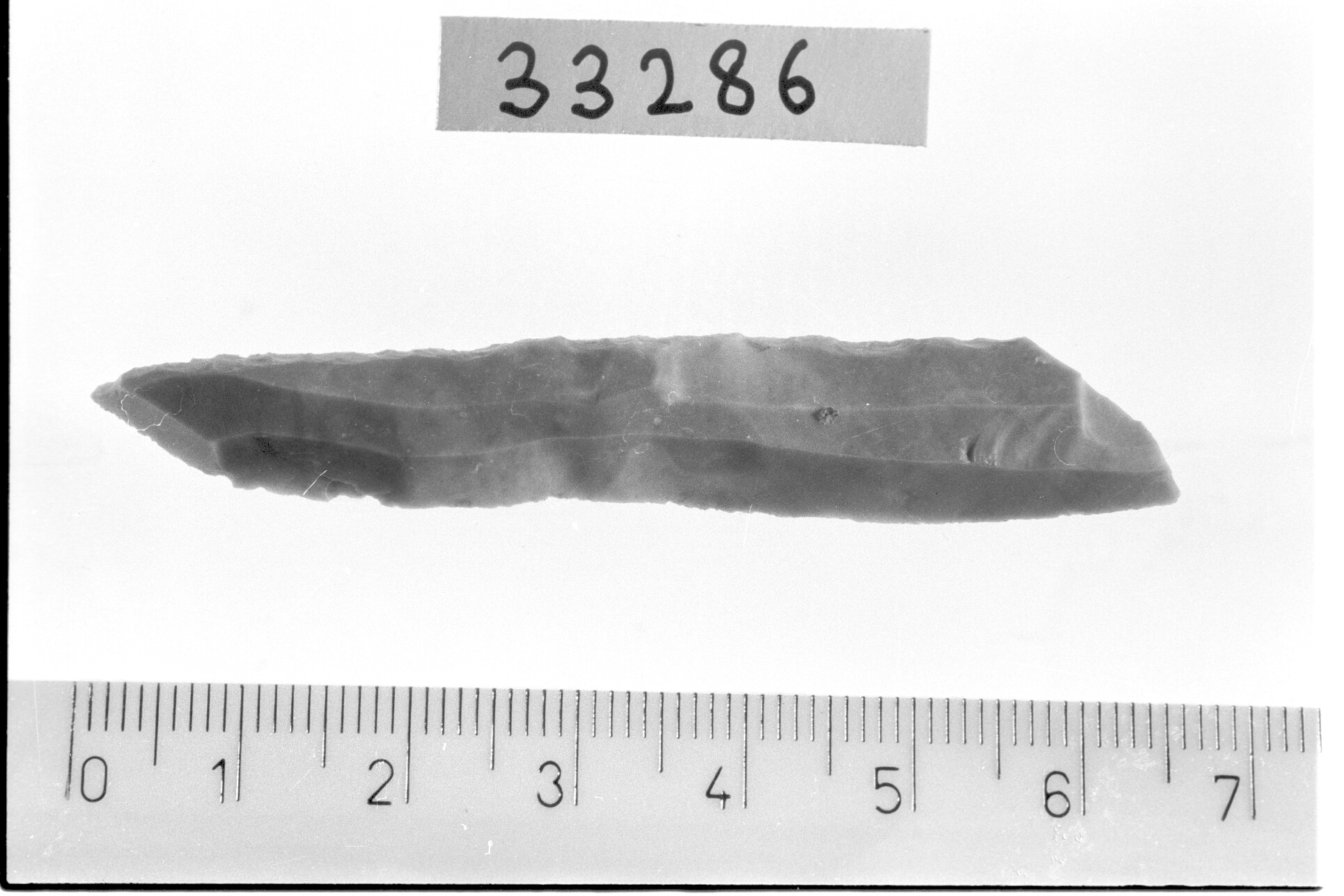 punta a dorso totale/ frammento - Epigravettiano (Paleolitico superiore)