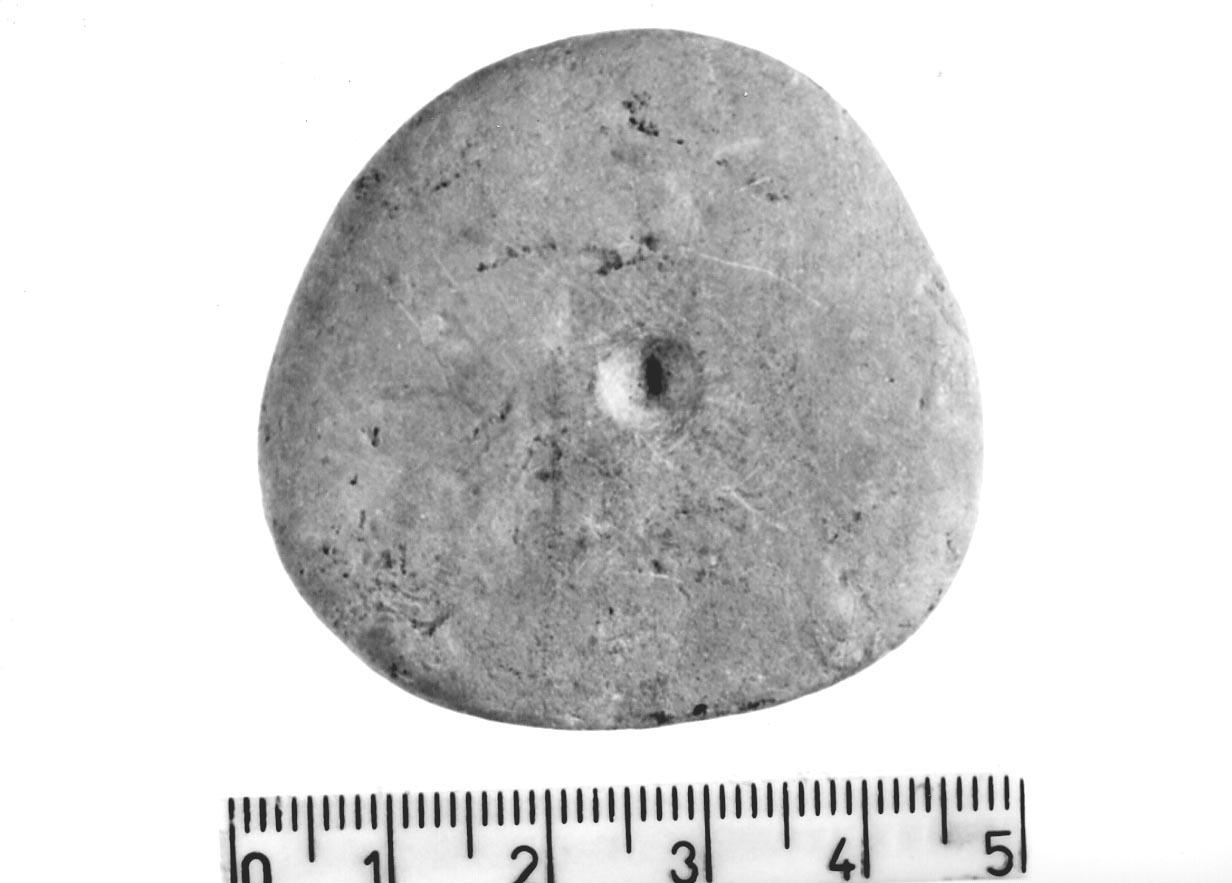 ciottolo con inizio di perforazione (Subneolitico)