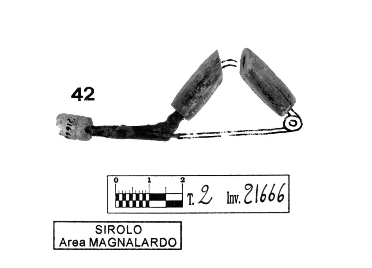 fibula con arco rivestito - fase Piceno IV B (fine/ inizio secc. VI-V a.C)