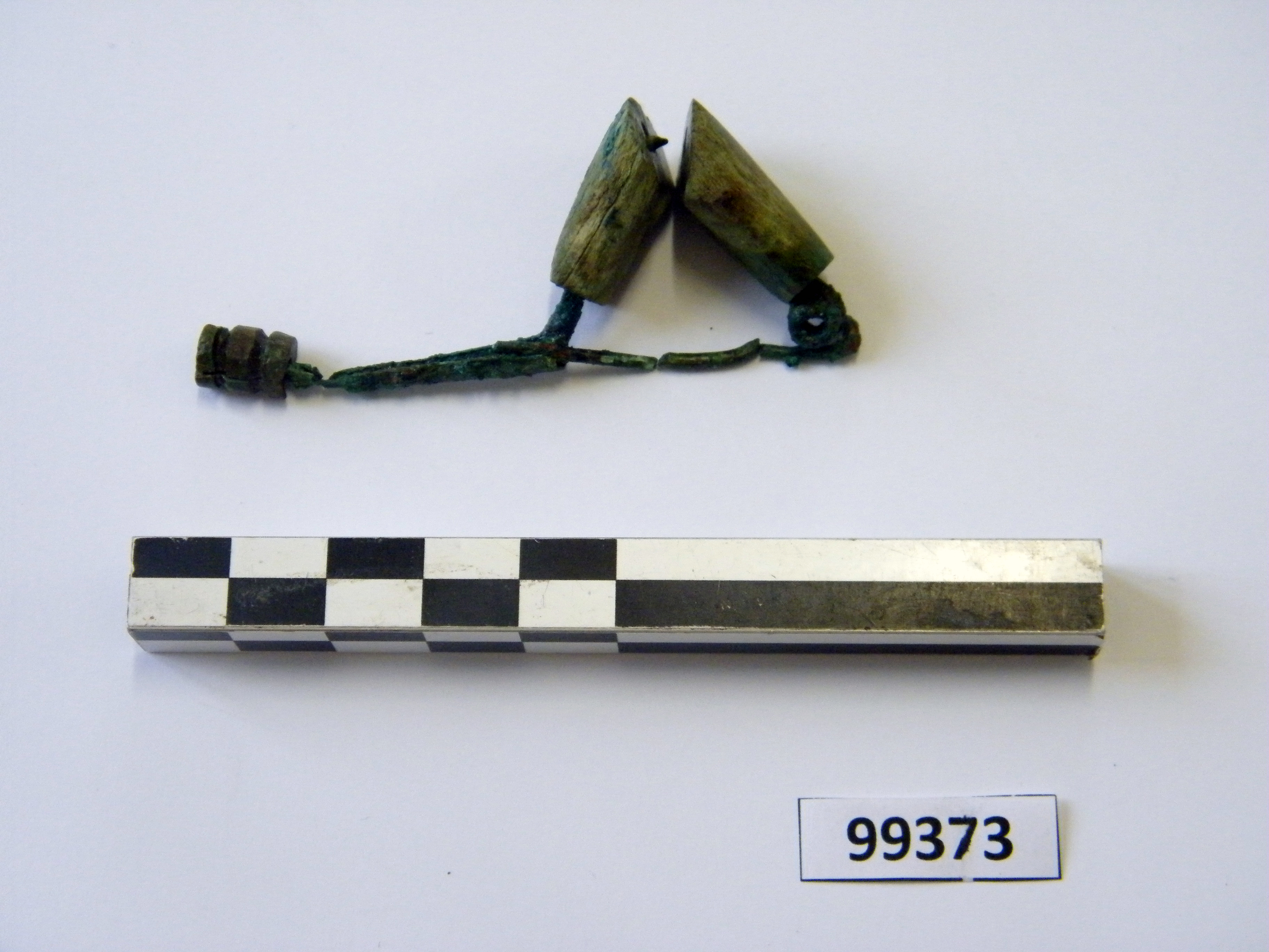 fibula, ad arco rivestito (sec. VI a.C)