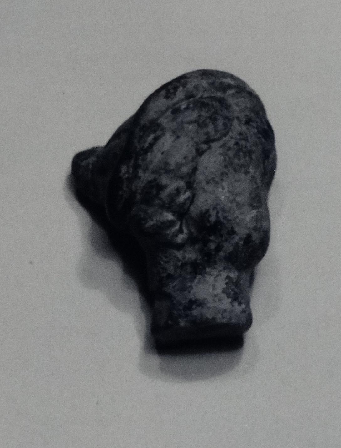 testa di figurina fittile (IV sec. a.C./III sec.a.C)