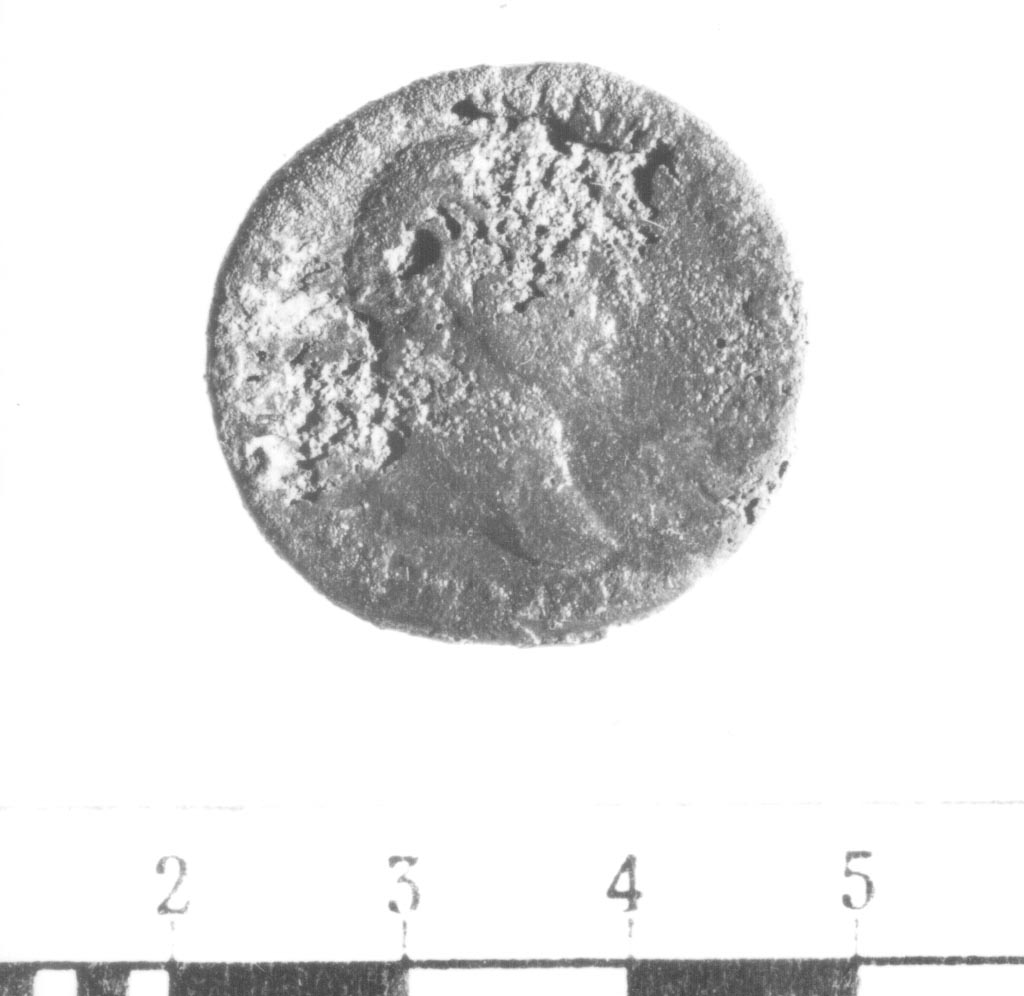R/ Busto laureato di Traiano a destra; V/ Colonna sul cui piedistallo poggia una pelle di leone (asse) (II sec. a.C)