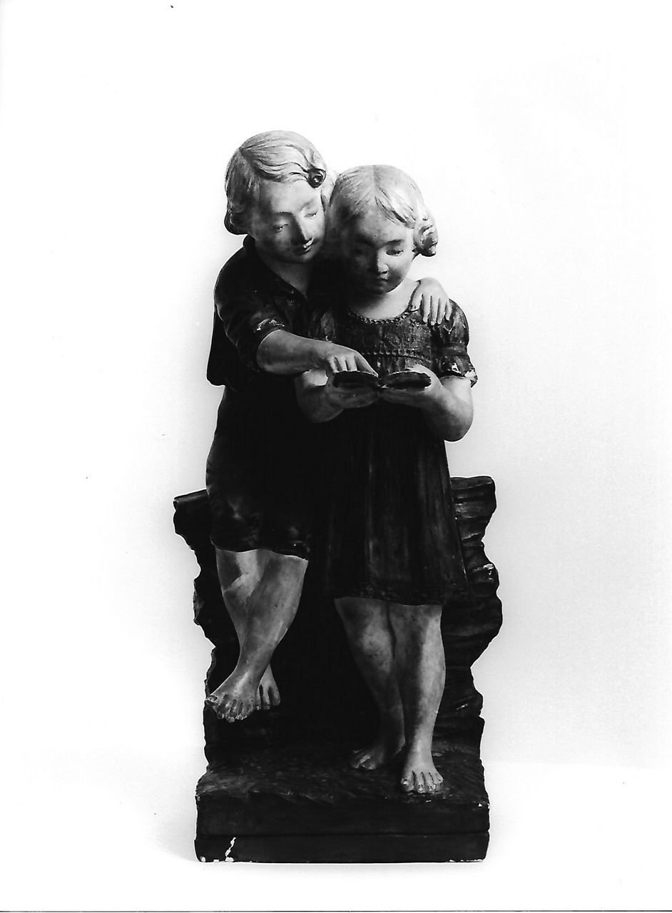 Bambino e bambina in letture (calco, opera isolata) - produzione coreglina (sec. XX)