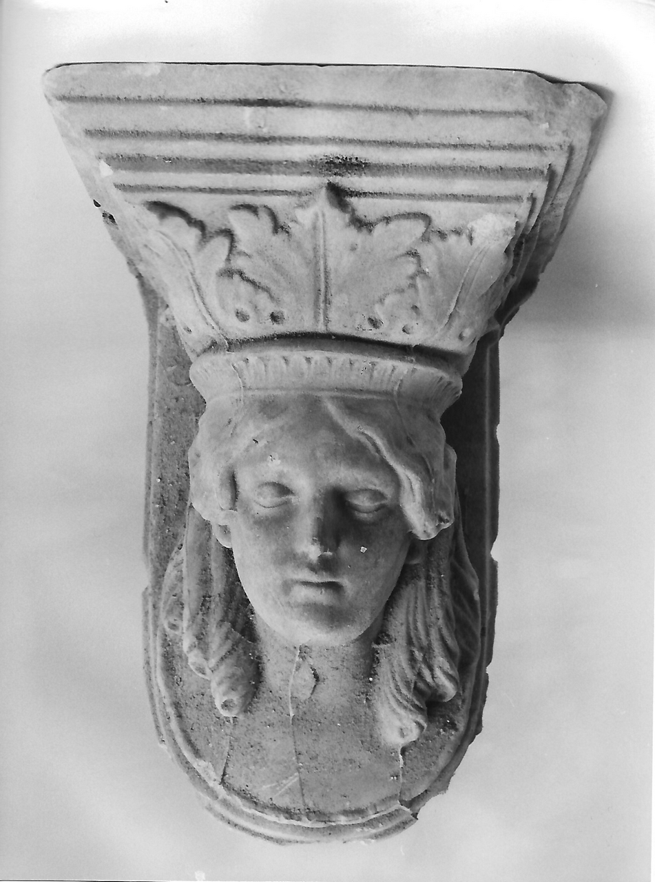 motivo decorativo con foglie d'acanto e volto femminile (calco, serie) - produzione coreglina (secc. XIX/ XX)