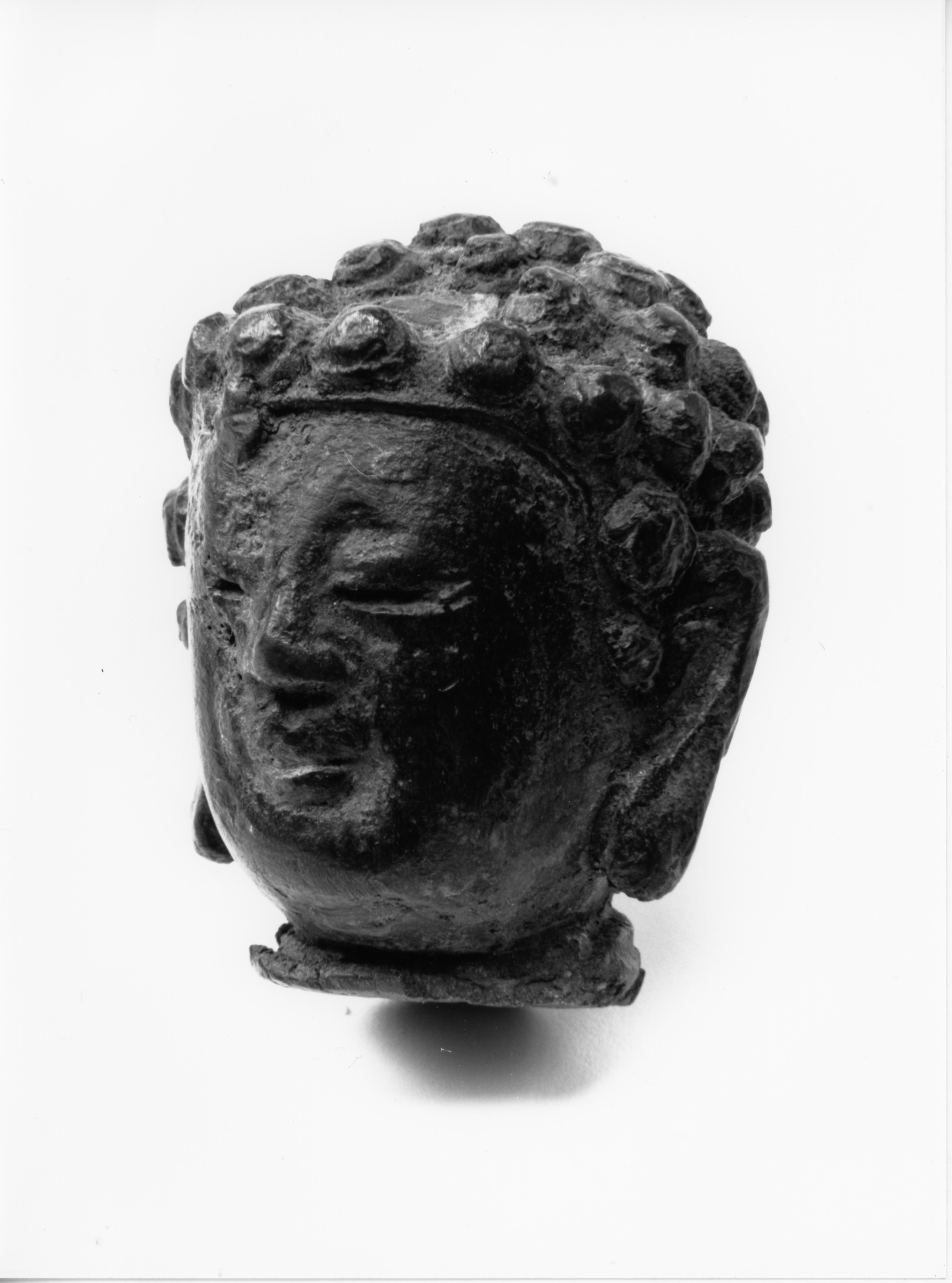 Buddha, Testa di divinità (bronzetto, frammento) - ambito cinese (secc. VII/ X)