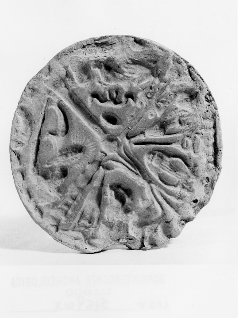 matrice di disco votivo - fabbrica tarantina (secc. V a.C.-IV a.C)