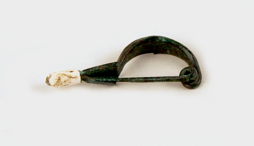 fibula/ ad arco semplice - Produzione apula (sec. VI a.C)