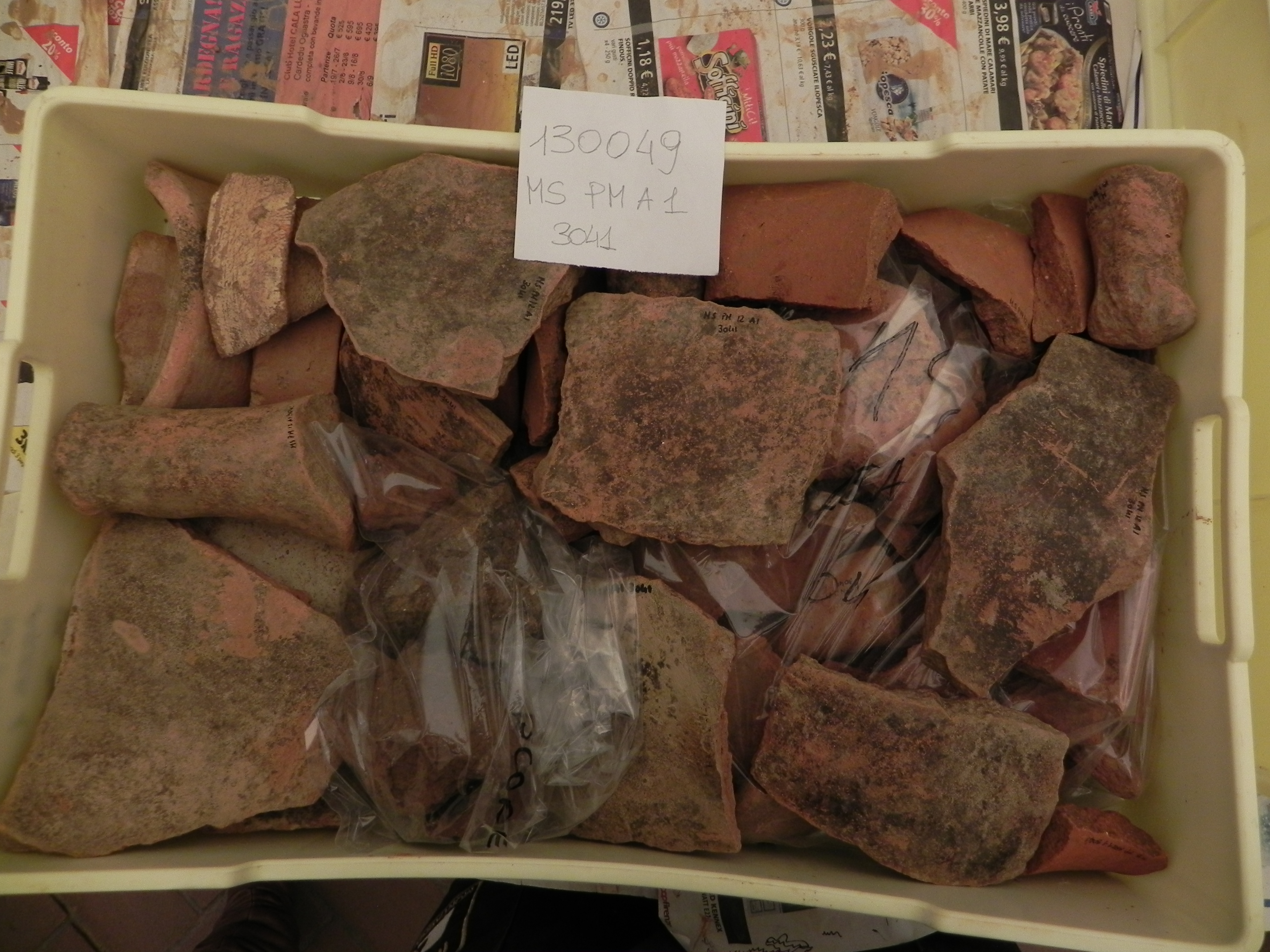 materiale proveniente da Unità Stratigrafica/ cassetta (materiale edilizio/ceramica/metalli) (epoca romana/indeterminata)