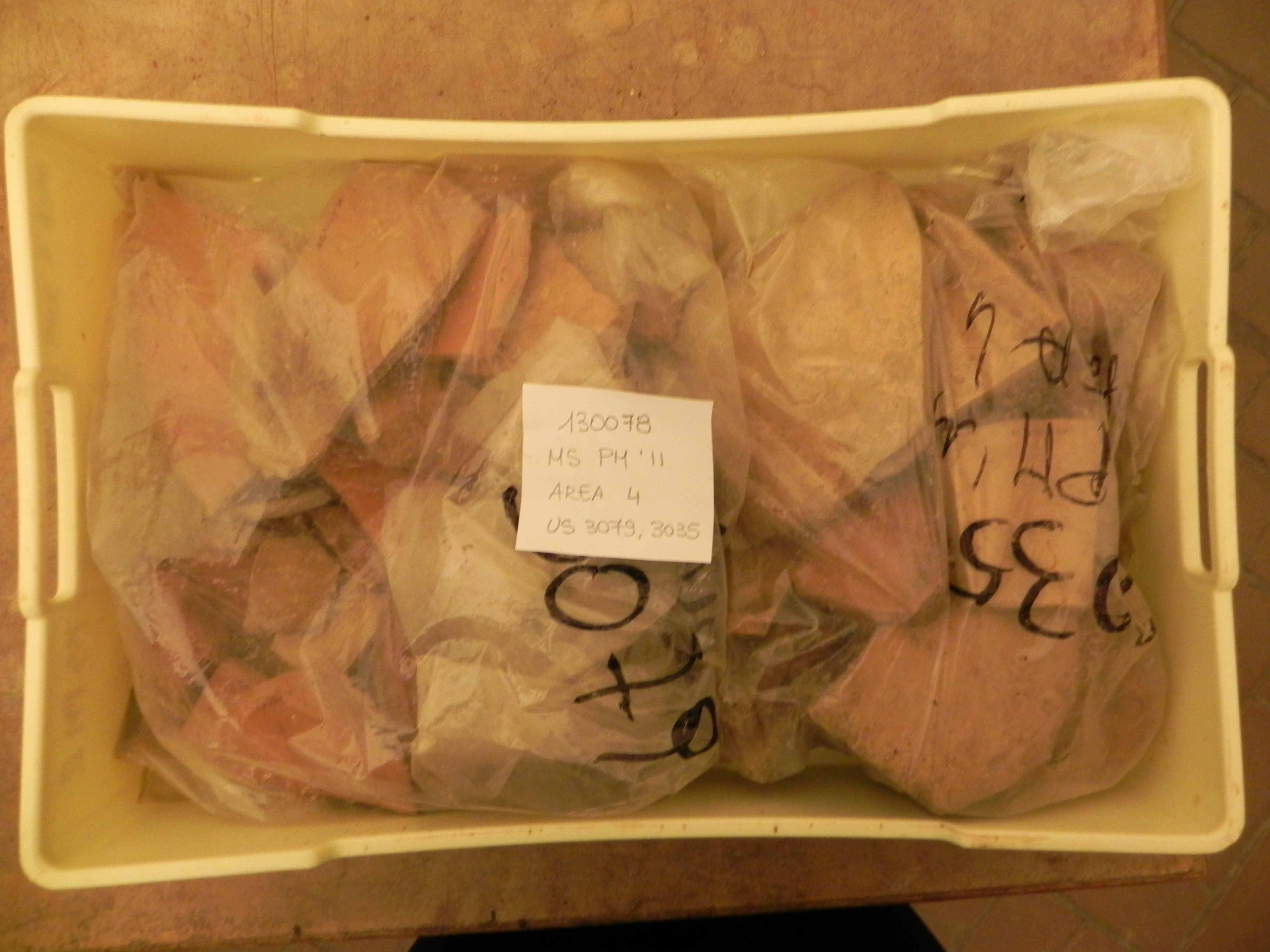 materiale proveniente da Unità Stratigrafica/ cassetta (materiale edilizio/ceramica/ossi/pietra) (Età romana/indeterminata)