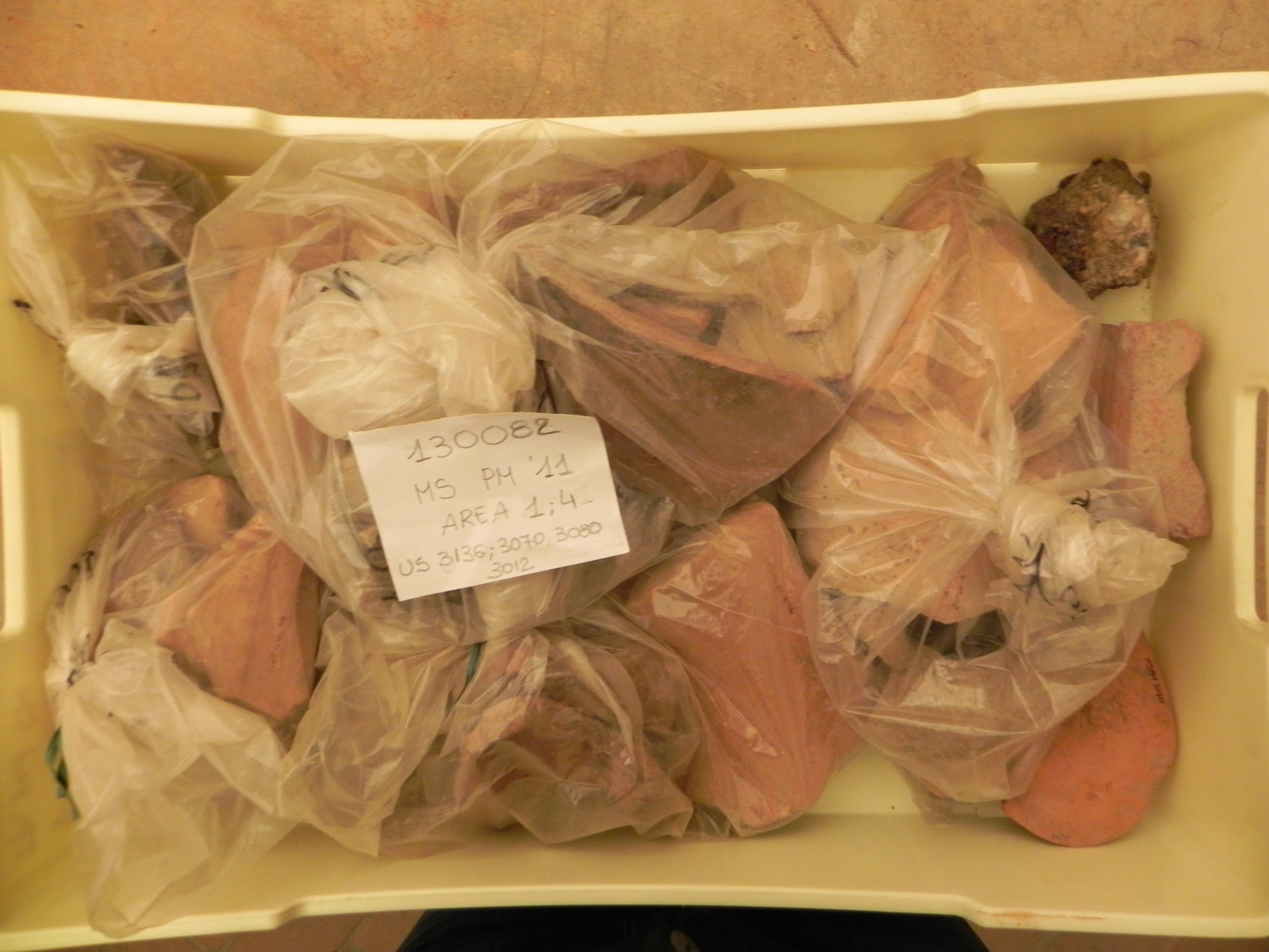 materiale proveniente da Unità Stratigrafica/ cassetta (materiale edilizio/ceramica/metallo/vetro/ossi) (Età romana/indeterminata)