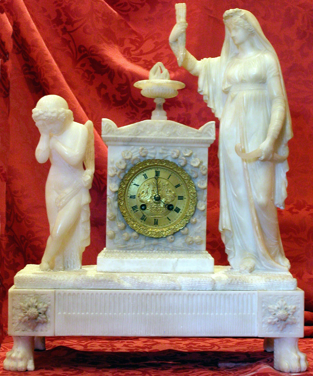 Orologio con due figure, orologio (orologio - da tavolo) - bottega volterrana (secc. XIX/ XX)