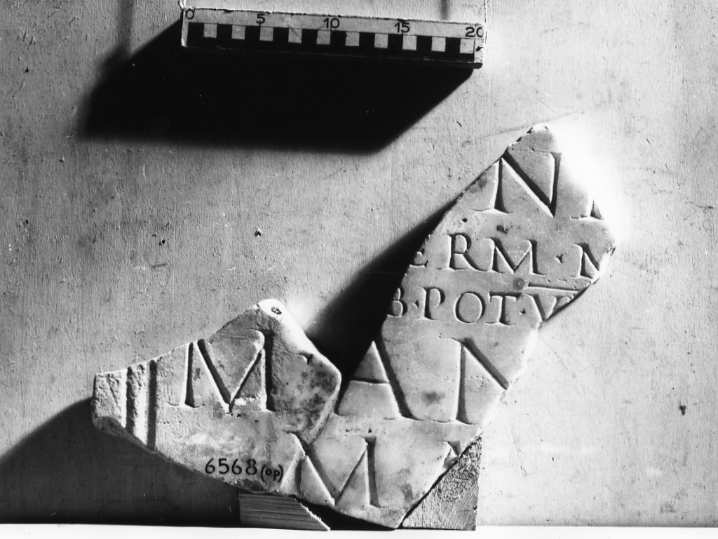 lastra iscritta opistografa (secc. II d.C.-III d.C)