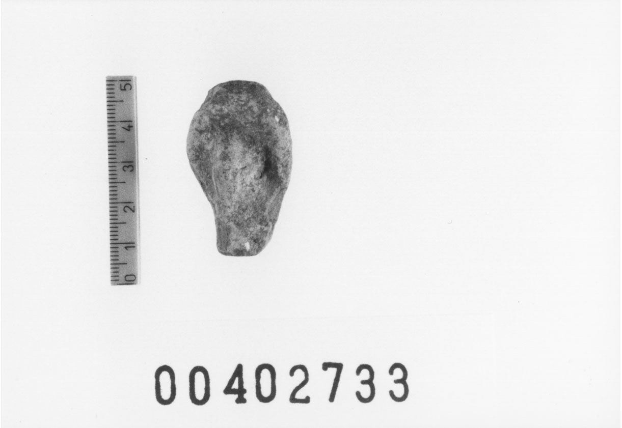 Figura femminile (Testa di statuetta, Comella, gruppo C I a 10) (III a.C, II a.C, I a.C)