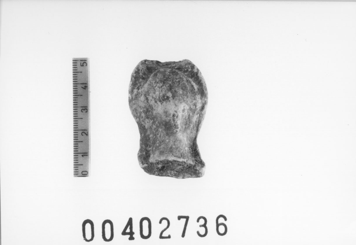 Figura femminile (Testa di statuetta, Comella, gruppo C I a 10) (III a.C, II a.C, I a.C)