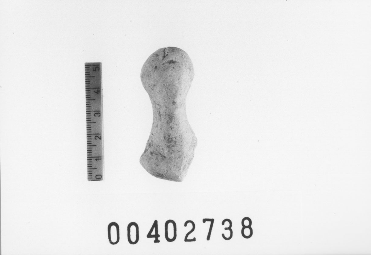 Figura femminile (Testa di statuetta, Comella, gruppo C I a 10) (III a.C, II a.C, I a.C)