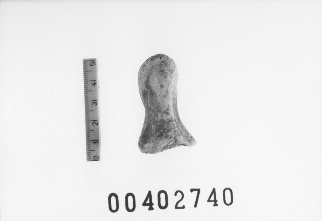 Figura femminile (Testa di statuetta, Comella, gruppo C I a 10) (III a.C, II a.C, I a.C)