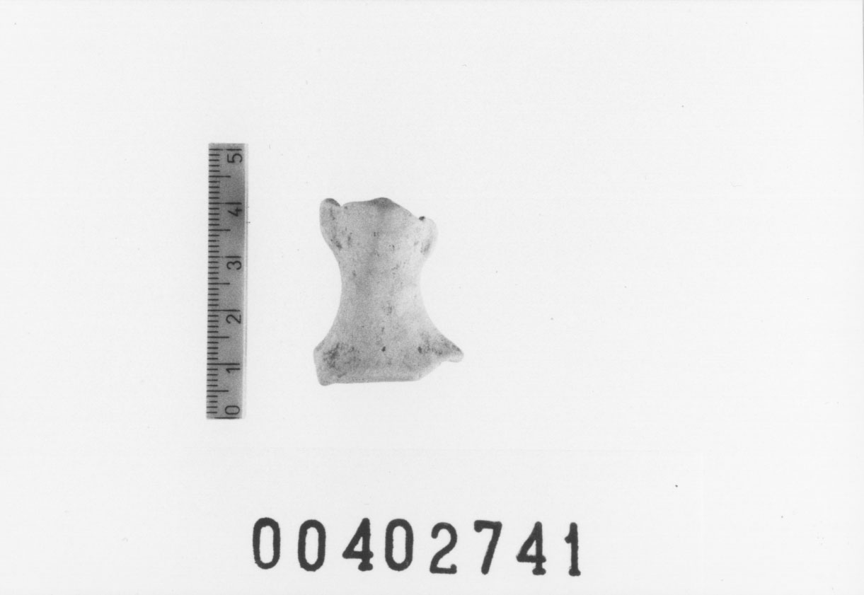 Figura femminile (Testa di statuetta, Comella, gruppo C I a 10) (III a.C, II a.C, I a.C)