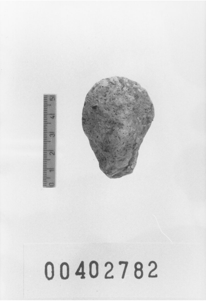 Figura femminile (Testa di statuetta, Comella, gruppo C I a 10) (III a.C, II a.C, I a.C)