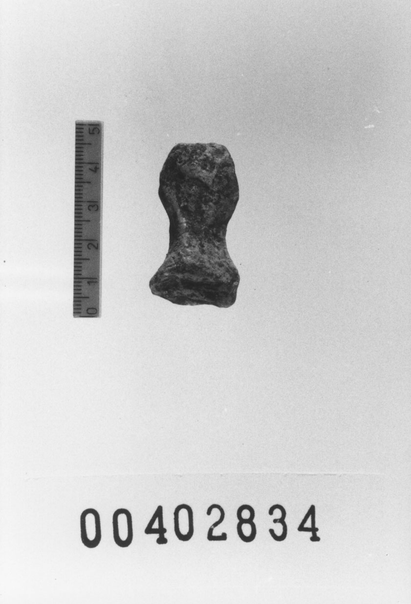 Figura femminile (Testa di statuetta, Comella, gruppo C I a 10) (III a.C, II a.C, I a.C)