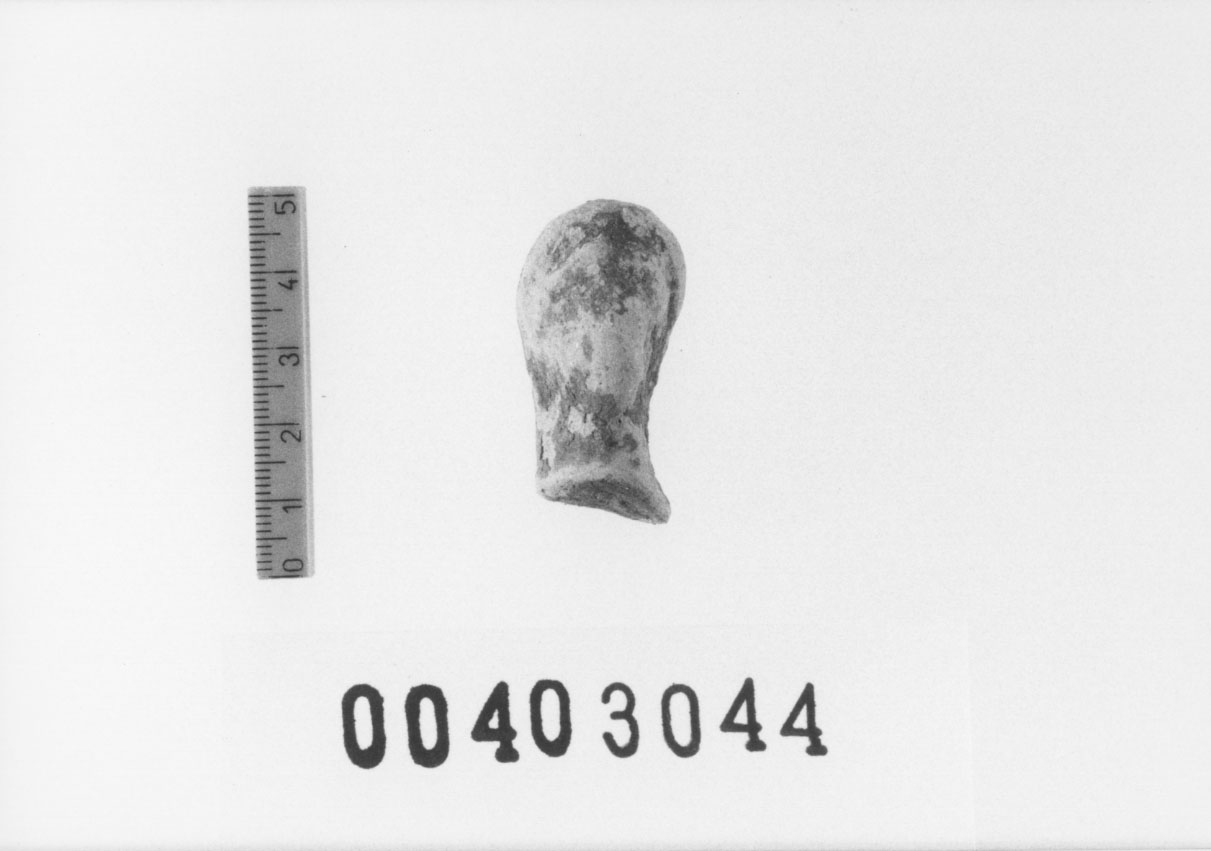 Figura femminile (Testa di statuetta, Comella, gruppo C I a 10) (III a.C, II a.C, I a.C)