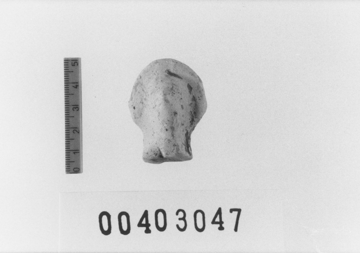 Figura femminile (Testa di statuetta, Comella, gruppo C I a 10) (III a.C, II a.C, I a.C)