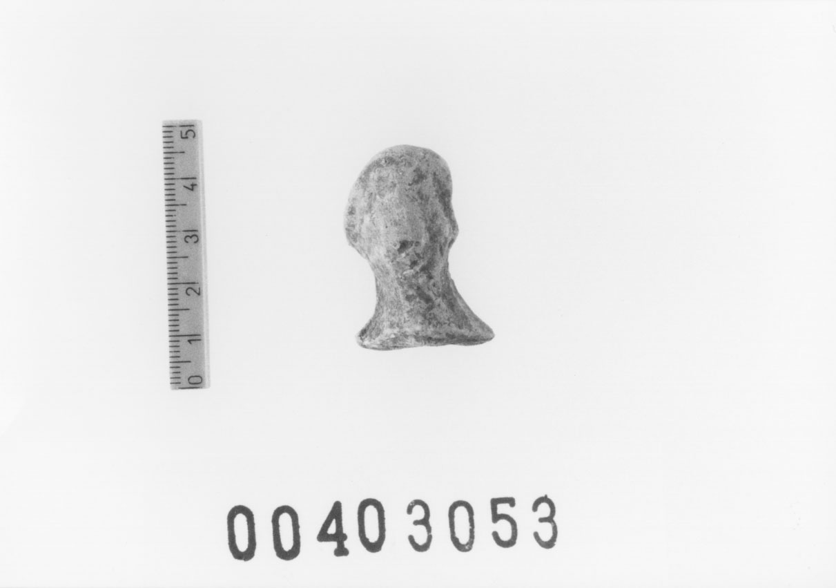 Figura femminile (Testa di statuetta, Comella, gruppo C I a 10) (III a.C, II a.C, I a.C)