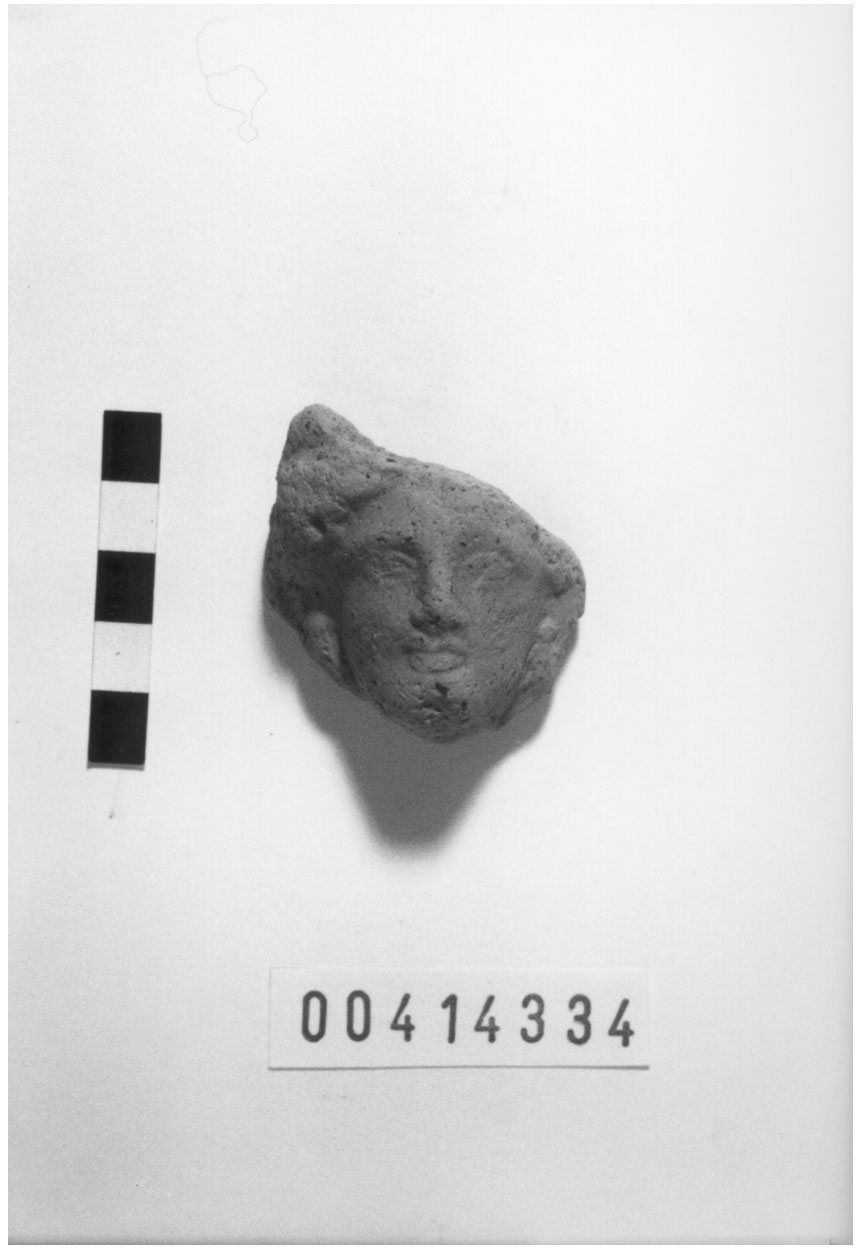 Figura femminile (Testa votiva/ frammento) (III a.C, II a.C)
