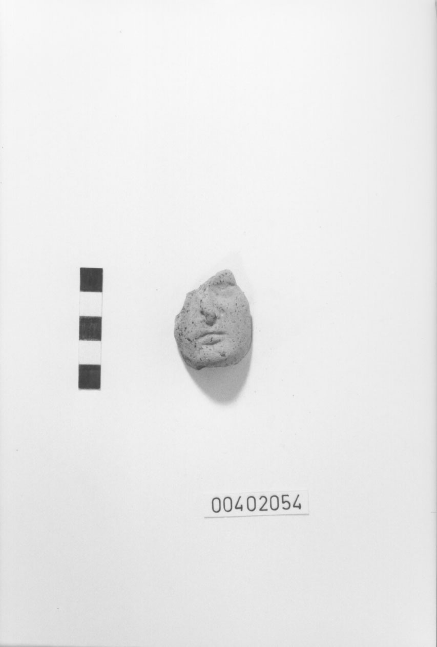 Figura femminile (Testa votiva/ frammento) (IV a.C, III a.C)