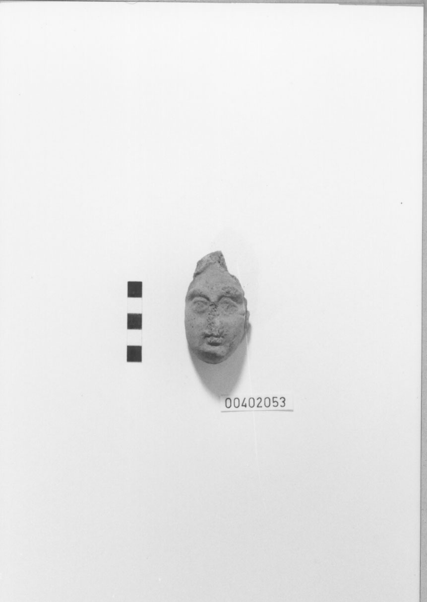 Figura femminile (?) (Testa votiva/ frammento) (III a.C, II a.C)