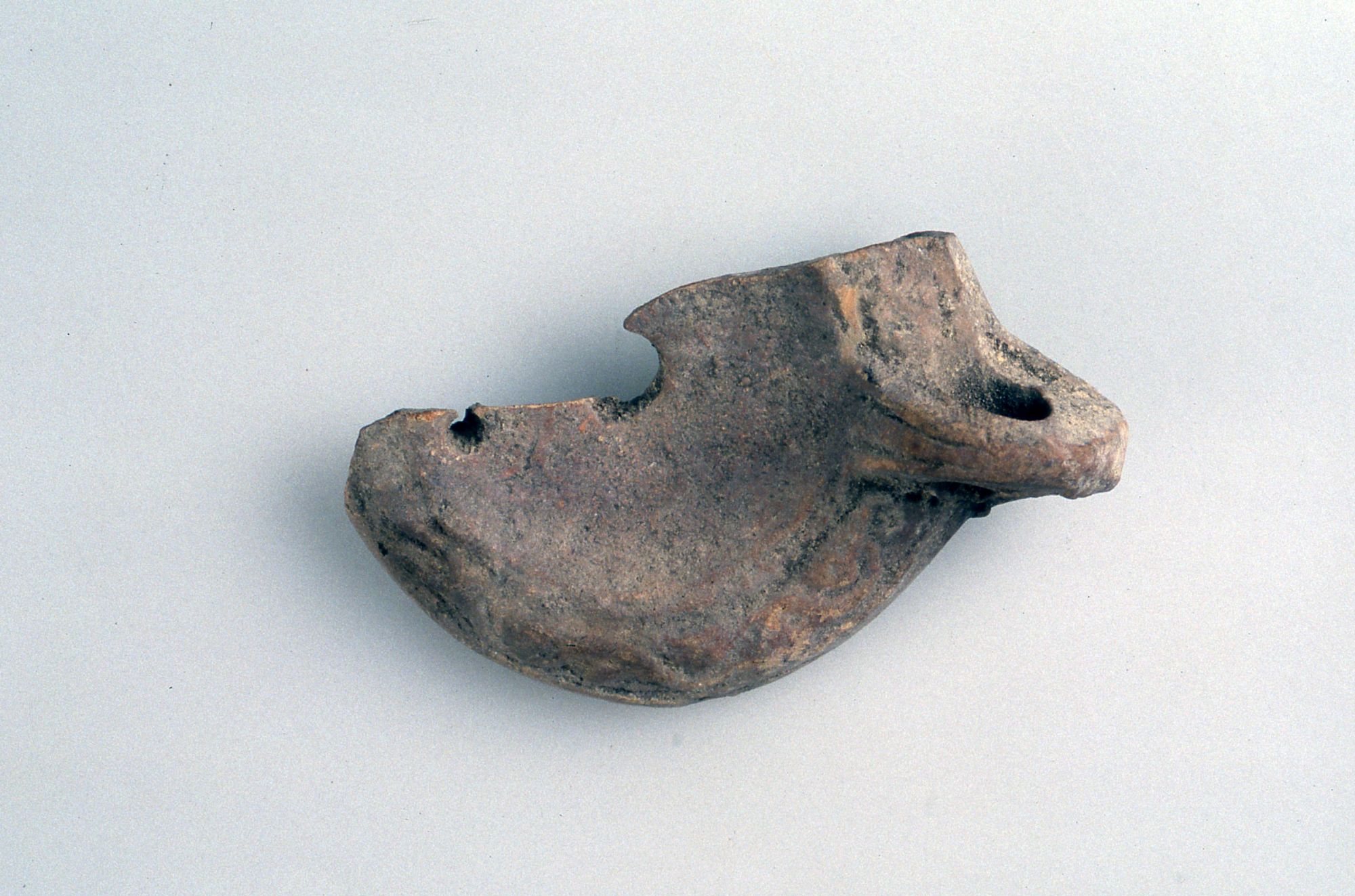 Lucerna a disco/frammento, Loeschcke VIII (Inizio Sec. II d. C)