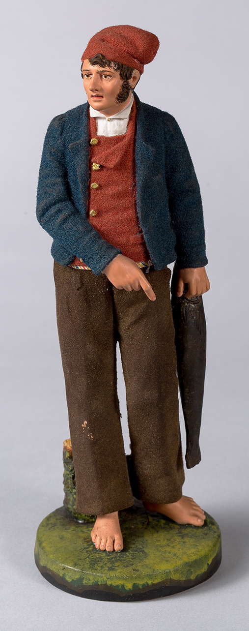 Uomo con berretto, recante un pesce nella mano sinistra (statuetta vestita) - manifattura portoghese (terzo quarto sec. XIX)