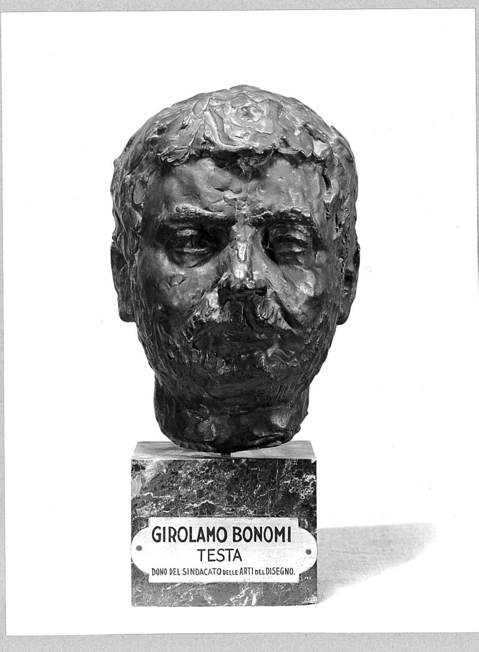 testa d'uomo (scultura) di Bonomi Girolamo (sec. XX)