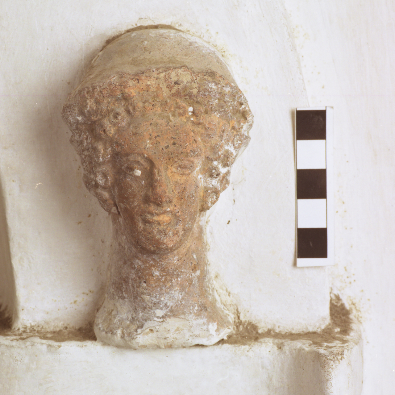 testa miniaturistica - arte etrusco-italica (sec. III-I a.C)