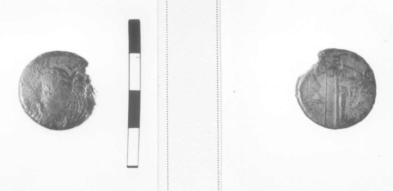Testa di dio fluviale/ Arco e ascia (moneta, nominale incerto) (III sec. d.C)