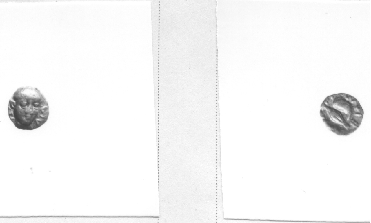 Testa giovanile / cozza (moneta, obolo) (IV sec. a. C)