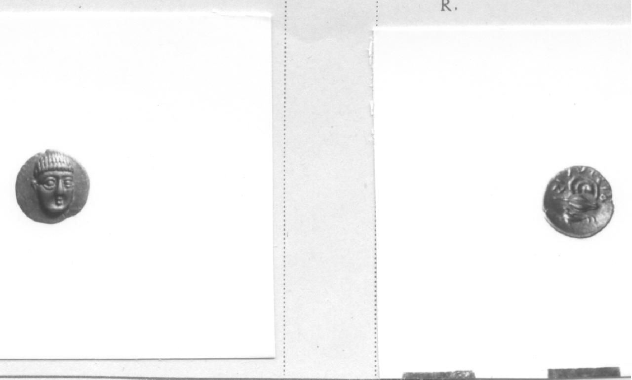 Testa giovanile / cozza (moneta, obolo) (IV sec. a. C)