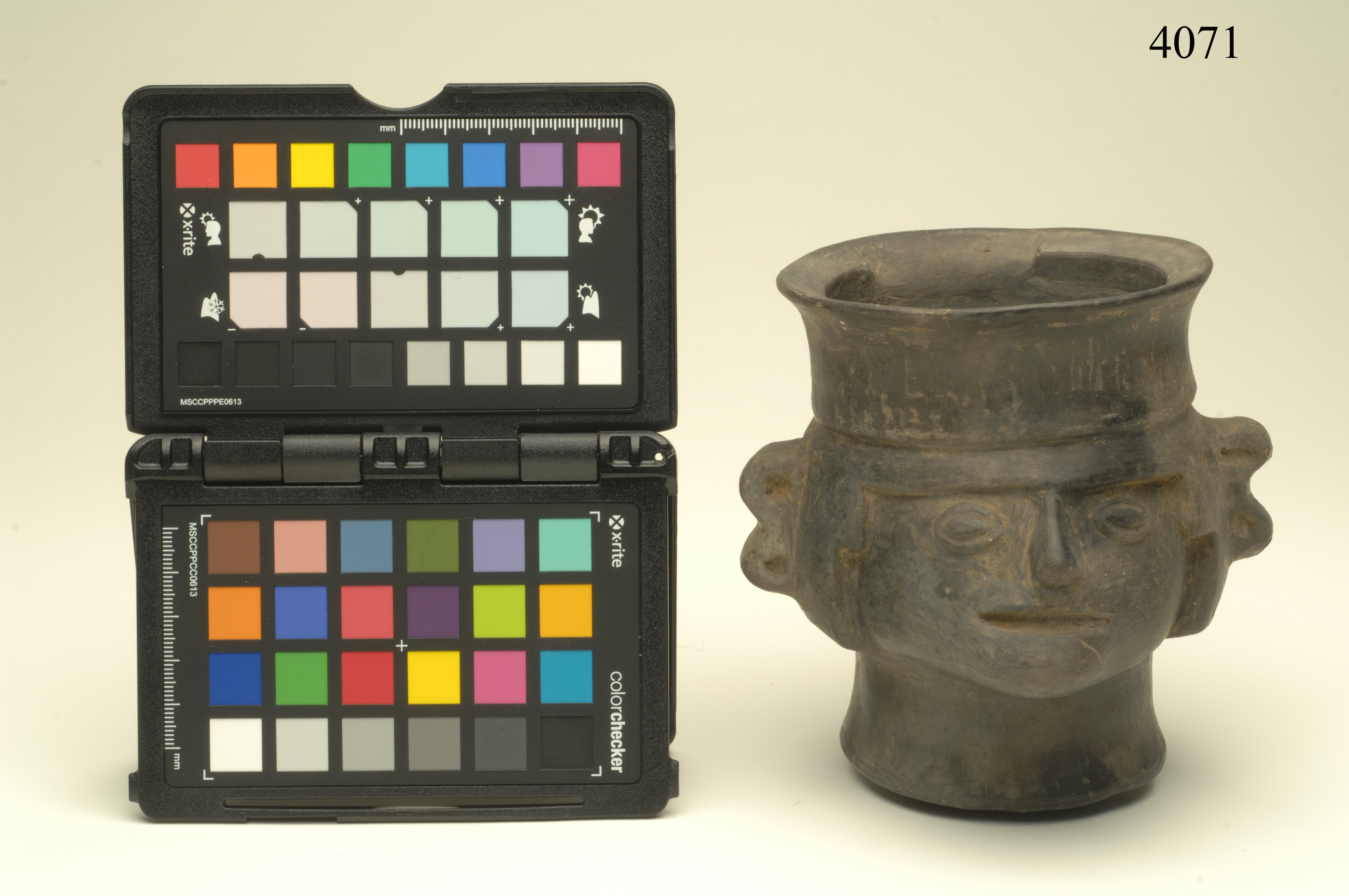 bottiglia, ad effigie cefalomorfa, ARREDI E SUPPELLETTILI/ CONTENITORI, RECIPIENTI E OGGETTI DI USO DOMESTICO - cultura Chimù-Inca