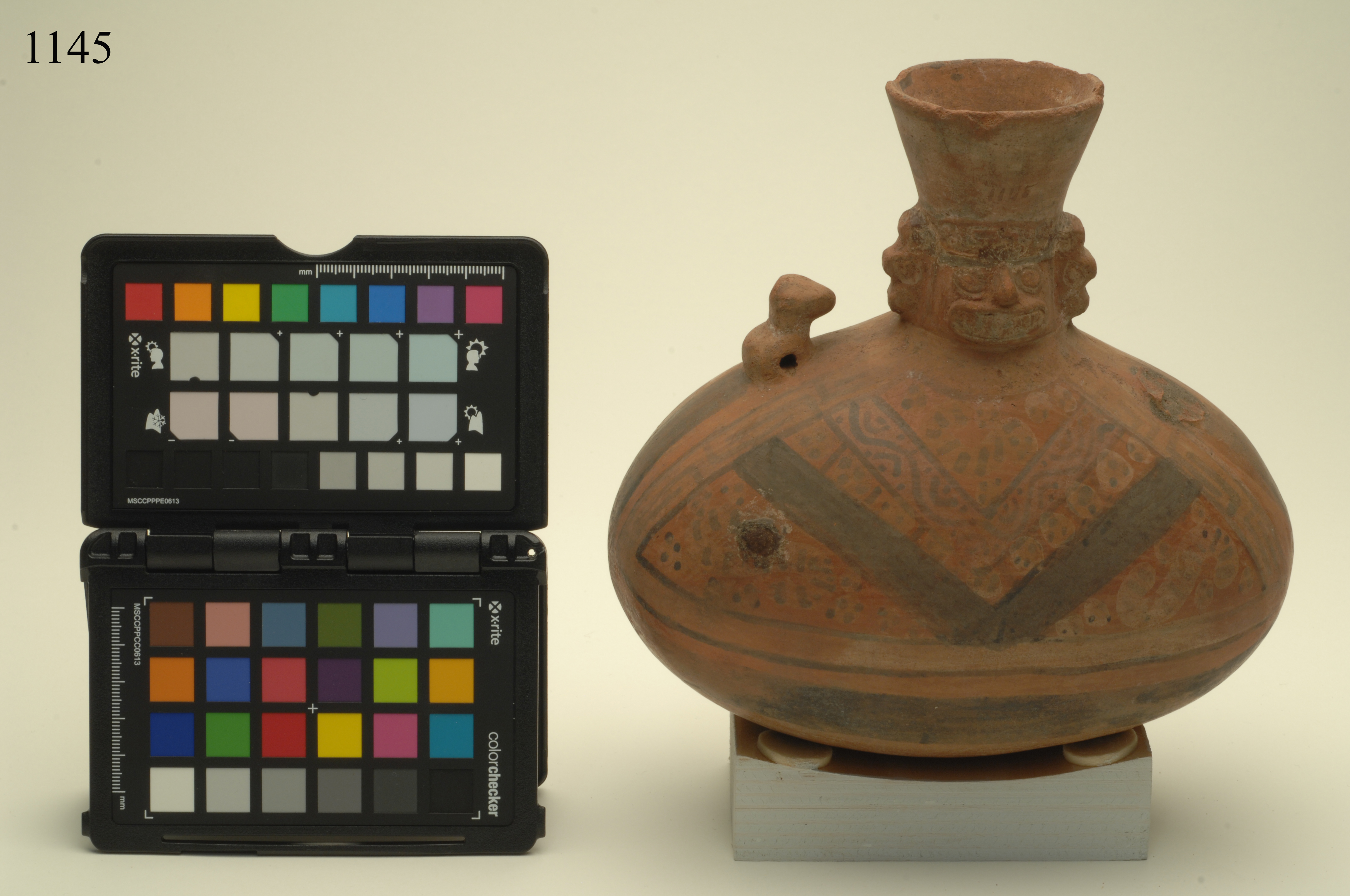 bottiglia, ad effigie antropomorfa, ARREDI E SUPPELLETTILI/ CONTENITORI, RECIPIENTI E OGGETTI DI USO DOMESTICO - cultura Chancay