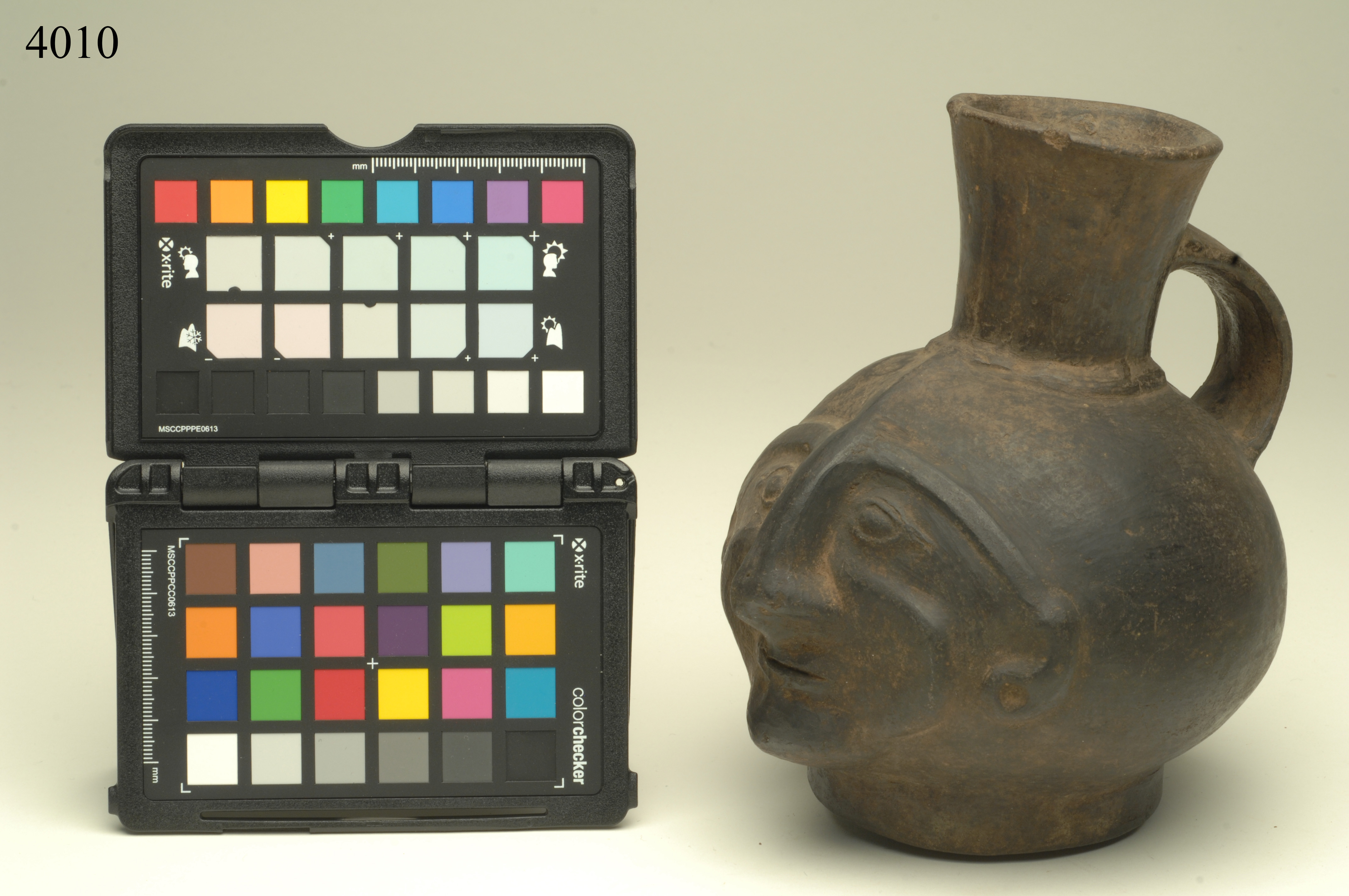 brocca, ad effigie cefalomorfa, ARREDI E SUPPELLETTILI/ CONTENITORI, RECIPIENTI E OGGETTI DI USO DOMESTICO - cultura Chimù-Inca