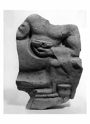 Recumbente su kline (RILIEVO, Iacobone C1 XIV) - produzione tarantina (inizio sec. V a.C)