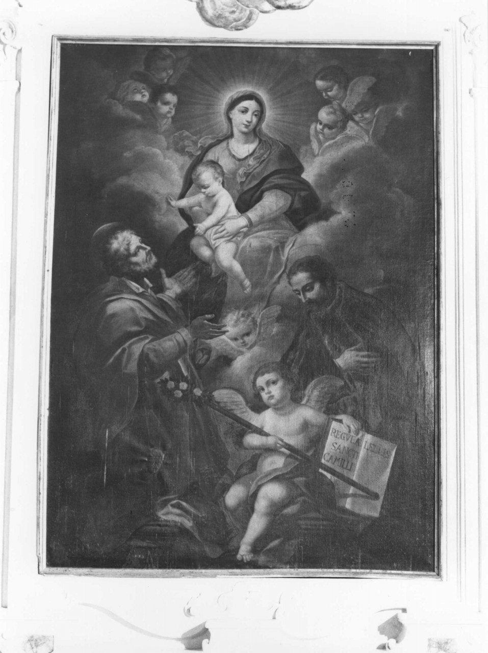 Madonna con Bambino in gloria tra San Giuseppe e San Camillo (dipinto) di Fabbroni Giacinto (sec. XVIII)