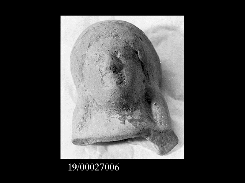 Storia/ personaggio femminile (testina) - produzione locale (fine SECOLI/ VI a.C)