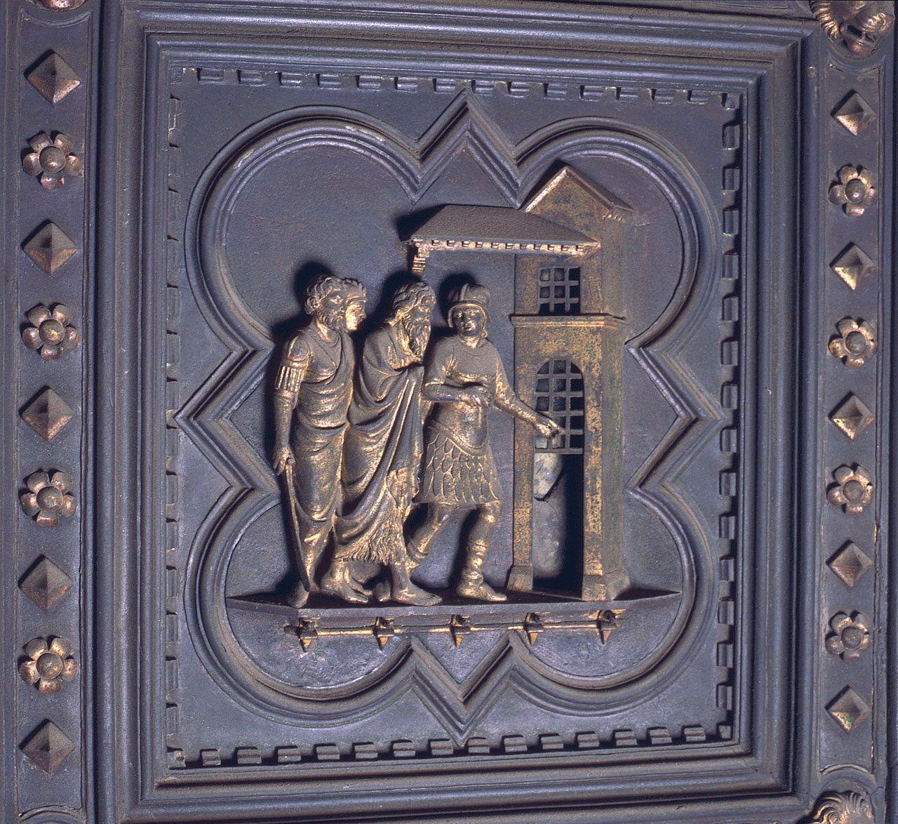 San Giovanni Battista condotto in carcere (formella) di Andrea Pisano, Piero di Donato, Piero di Jacopo, Dini Lippo (sec. XIV)