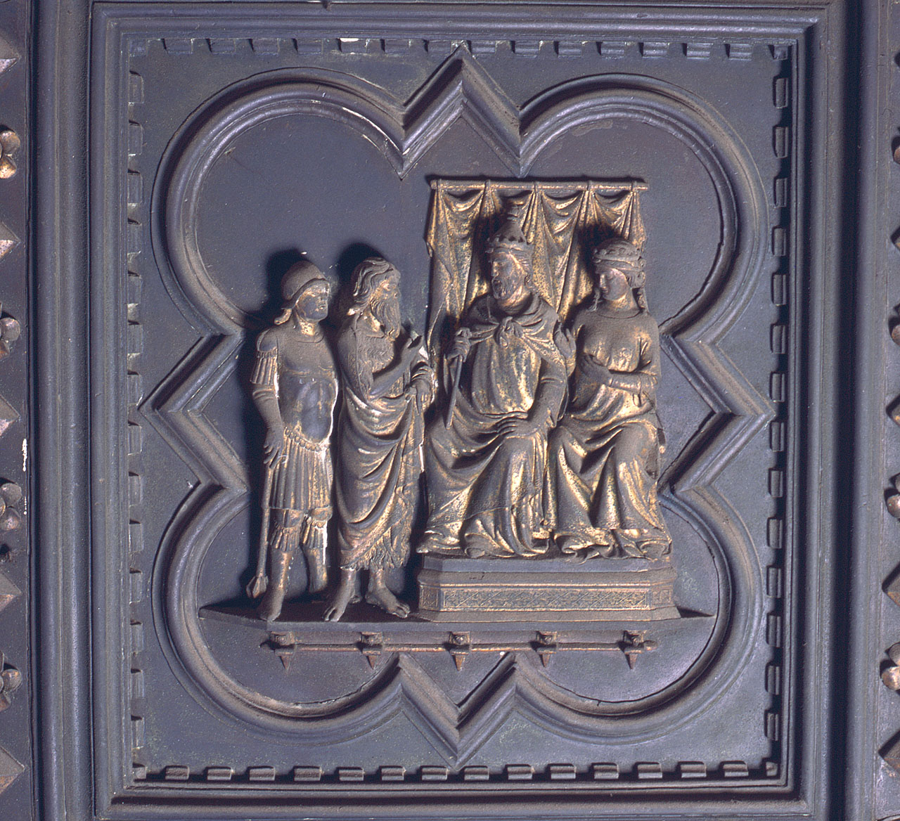 San Giovanni Battista condotto davanti a Erode ed Erodiade (formella) di Andrea Pisano, Piero di Donato, Piero di Jacopo, Dini Lippo (sec. XIV)
