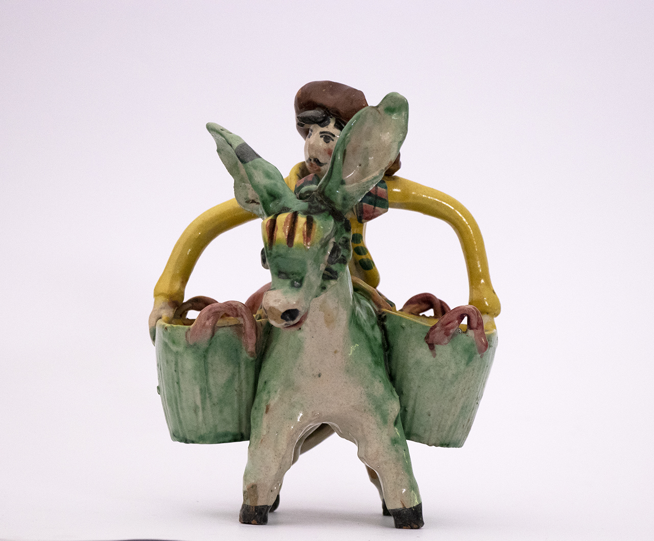Uomo su asino (scultura, opera isolata) - scuola vietrese (prima metà XX)