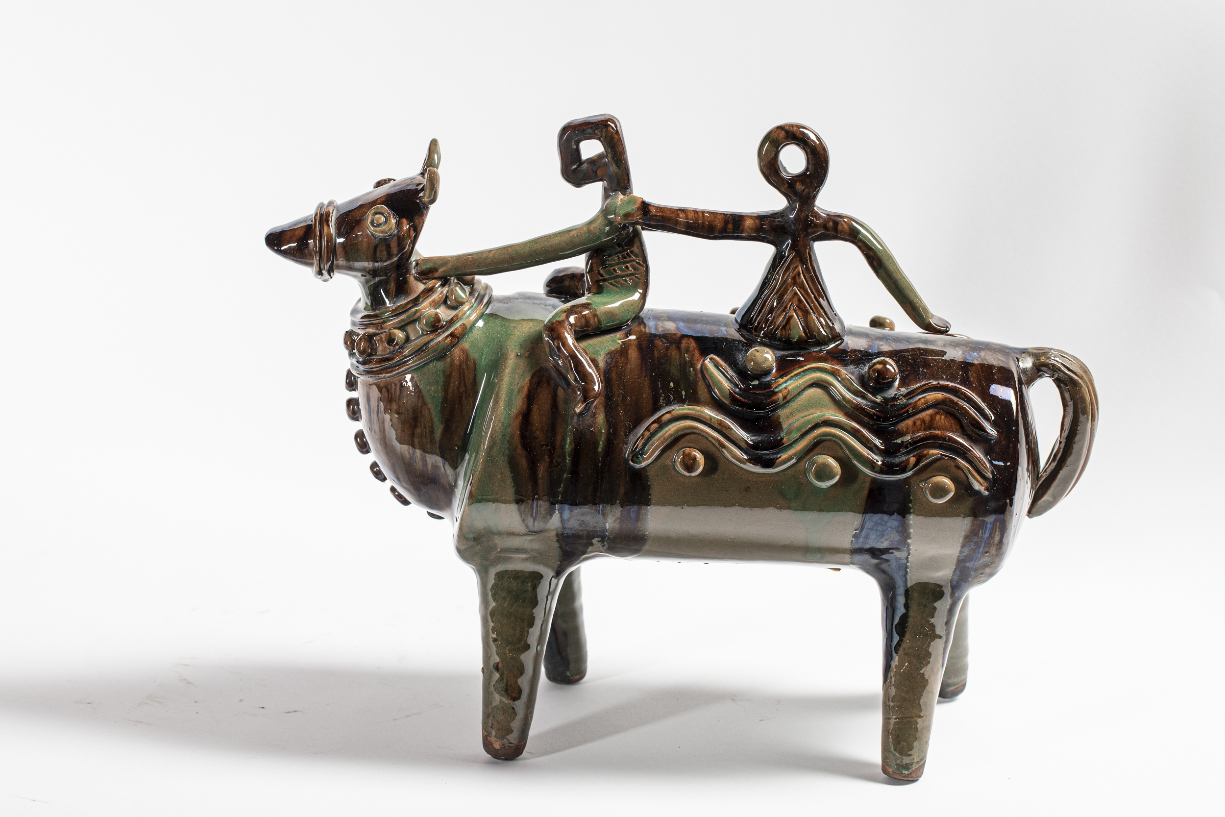 uomo e donna a cavallo (scultura, opera isolata) di Farci Vincenzo (terzo quarto XX)