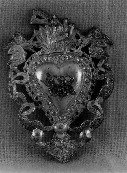 motivi decorativi/ angioletti/ cherubino (ex voto, opera isolata) - bottega genovese (secondo quarto sec. XX)